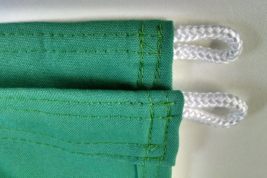 Green webbing straps with visible stitching.