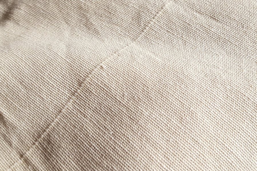A close-up of a natural linen weave.