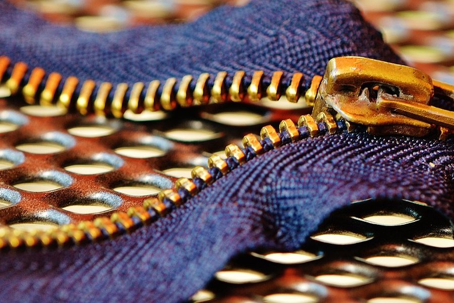 A close-up of a purple zip.