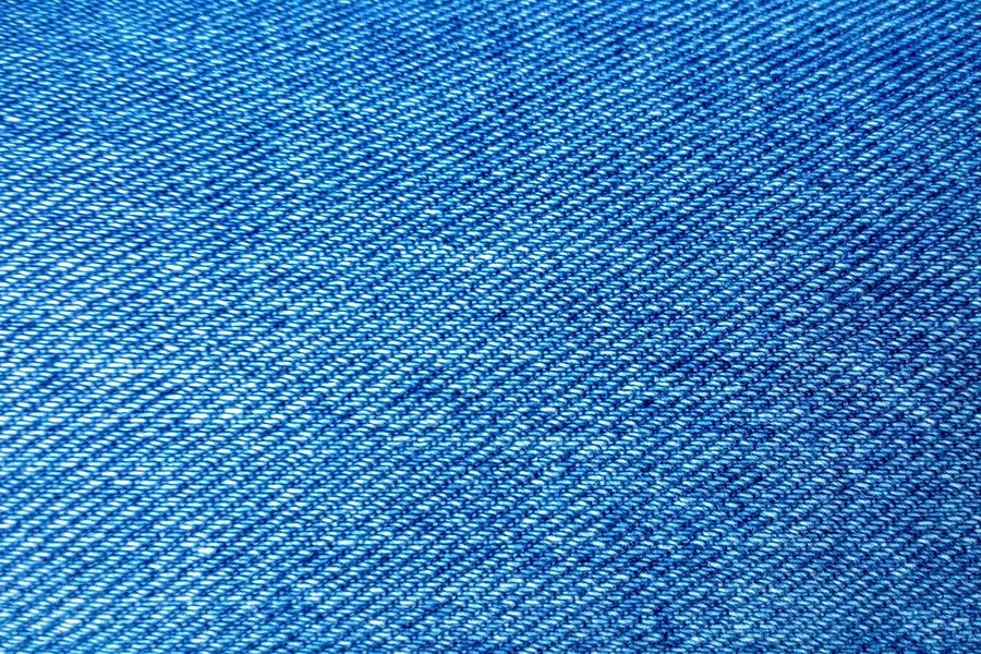 A close-up of a blue woven fabric.