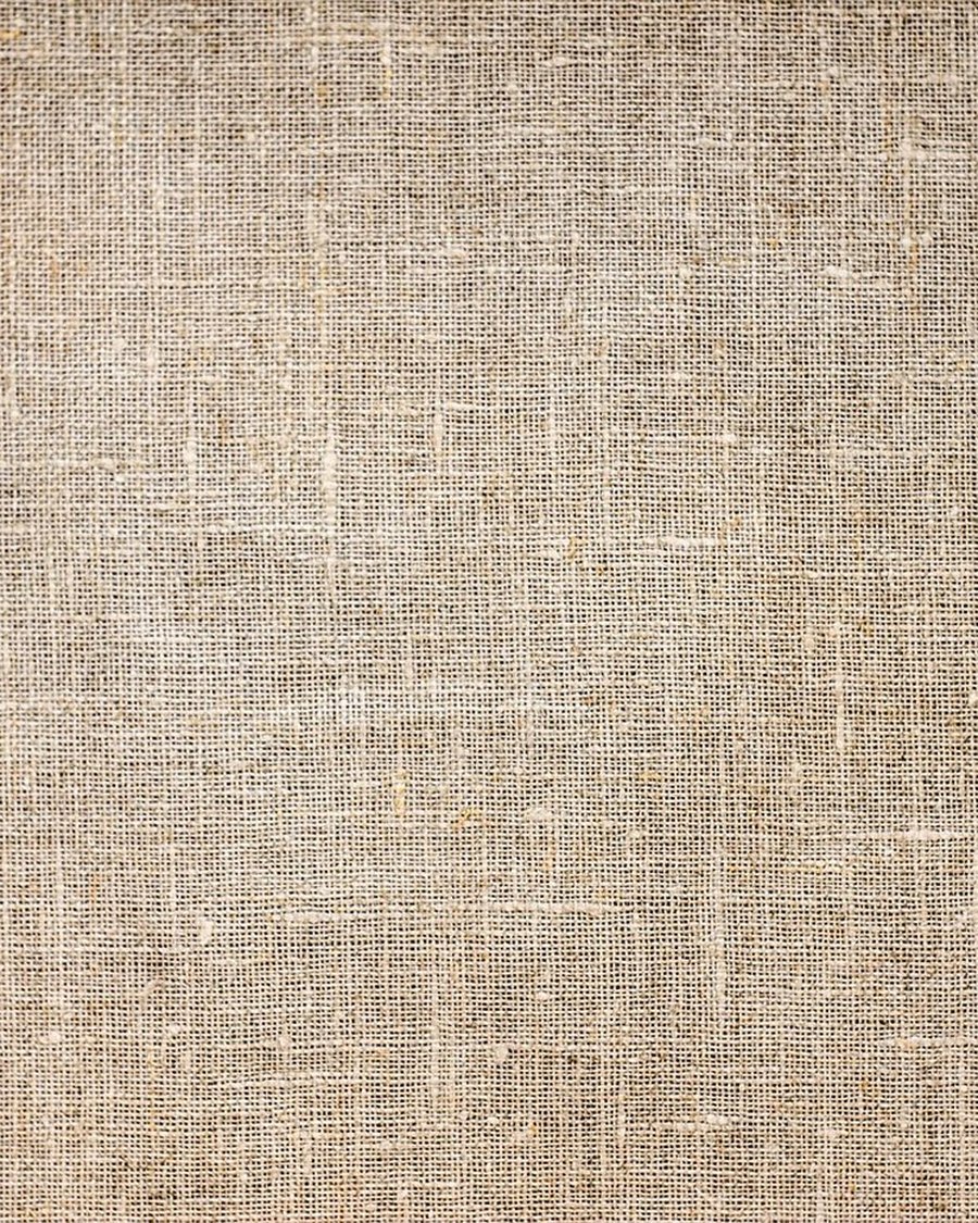A close weave of natural linen fabric.