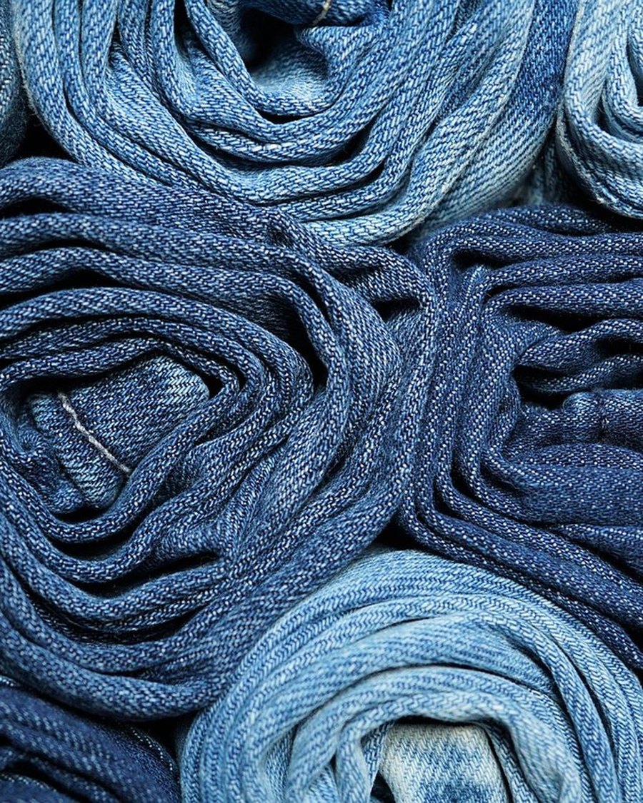 A stack of folded indigo jeans.